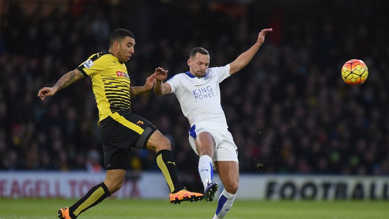 Troy Deeney and Danny Drinkwater compete for the ball during the Barclays Premier League match between Watford and Leicester