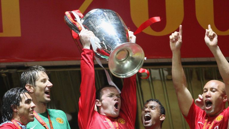 Wayne Rooney of Manchester United celebrates with the trophy after winning the Champions League in 2008