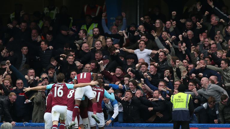 West Ham celebrate Carroll's goal in front of the travelling fans