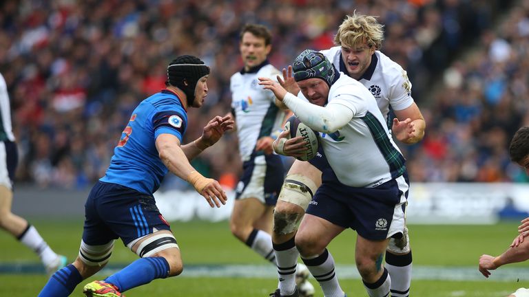 WP Nel of Scotland is challenged by Yacouba Camara of France during the RBS Six Nations match between Scotland and France at Murrayfield