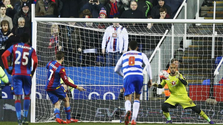 Yohan Cabaye of Crystal Palace (7) scores their first goal past goalkeeper Ali Al-Habsi of Reading 
