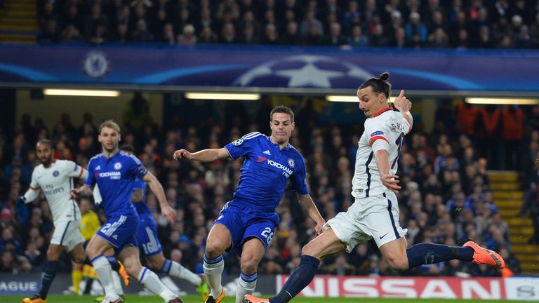 Paris Saint-Germain forward Zlatan Ibrahimovic (R) takes a shot