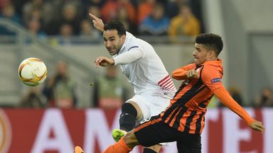 Image of Sevilla's Adil Rami (left) takes on Taison of FC Shakhtar in the Europa League semi-final