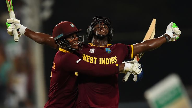 Carlos Brathwaite (R) and team-mate Marlon Samuels celebrates West Indies' World Twenty20 final win over England