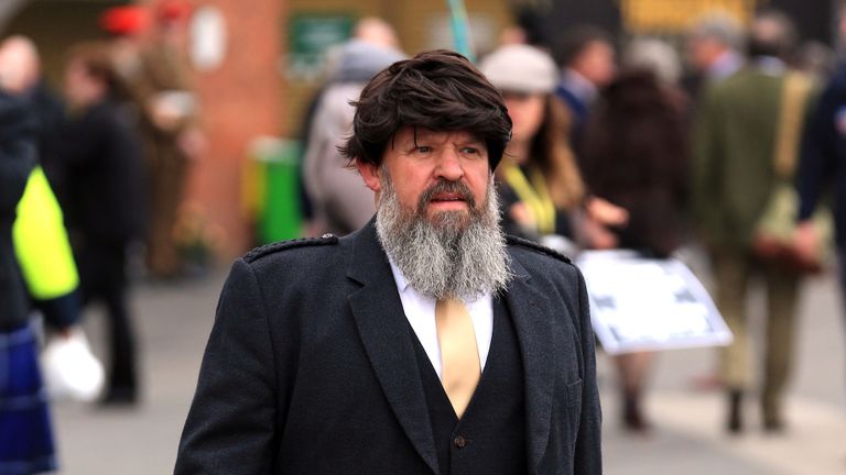 A racegoer during Ladies Day of the Crabbie's Grand National