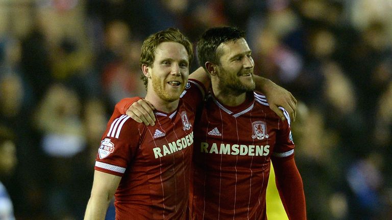 Adam Forshaw and David Nugent celebrate winning the former's late goal over Reading