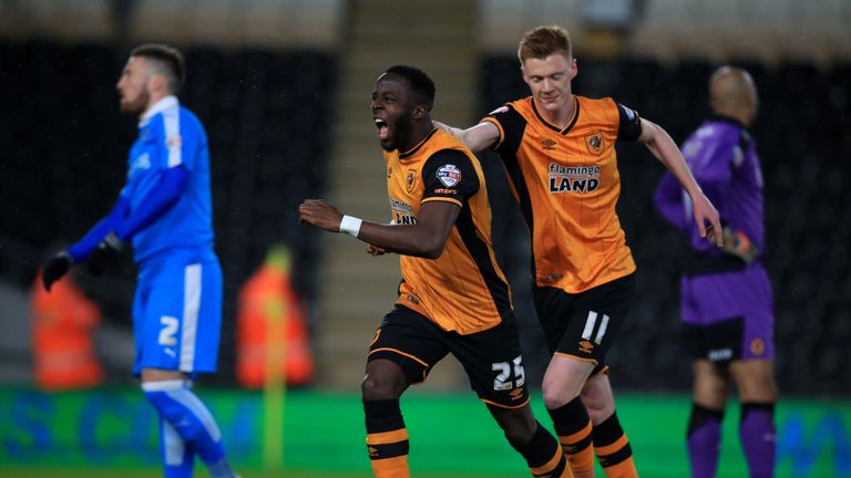 Hull City's Adama Diomande celebrates scoring the first goal with Sam Clucas (r) v Wolves, Championship