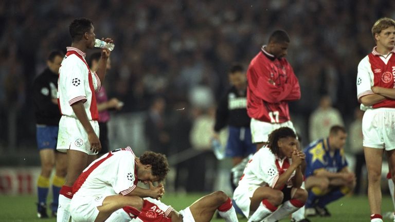 23 May 1996: Despairing  Ajax Amsterdam players watch the penalty shoot out in the European Cup Final against Juventus in Rome, Italy. Juventus won the pen