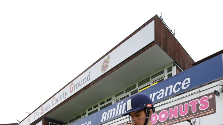 Essex's Alastair Cook heads out to bat during day one of the Specsavers County Championship match at the Essex County Ground, Chelmsford.