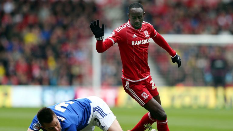 Middlesbrough's Albert Adomah (right) battles for the ball with Ipswich Town's Jonas Knudsen (left) during the Sky Bet Championship match at The Riverside 