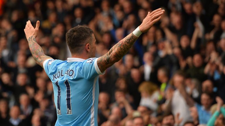 Manchester City's Serbian defender Aleksandar Kolarov celebrates after scoring their fourth goal