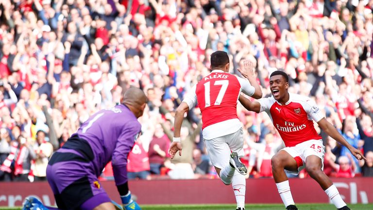 Alexis Sanchez  of Arsenal celebrates scoring his team's first goal against Watford