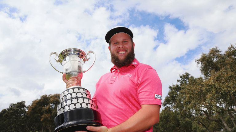 SOTOGRANDE, SPAIN - APRIL 17:  Andrew Johnston of England celebrates with the trophy after victory during the final round on day four of the Open de Espana