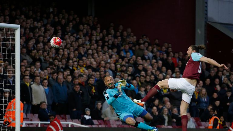 Andy Carroll volleys past Heurelho Gomes to open the scoring at Upton Park
