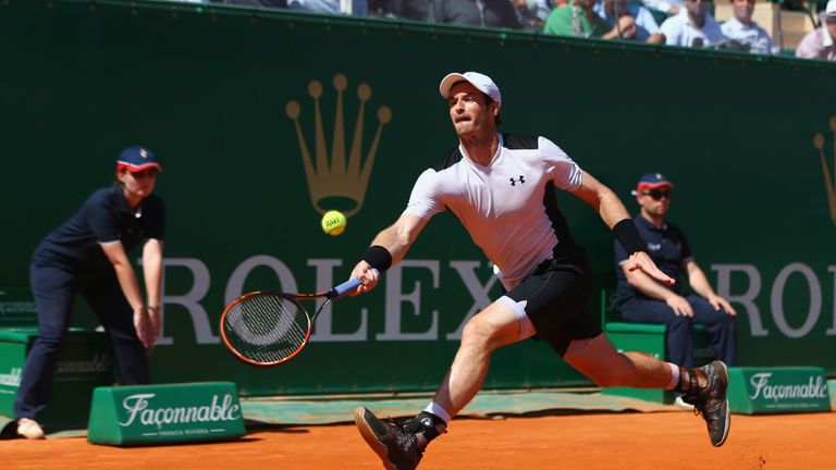 MONTE-CARLO, MONACO - APRIL 16:  Andy Murray of Great Britain stretches to return during his semi-final match against Rafael Nadal of Spain during the semi