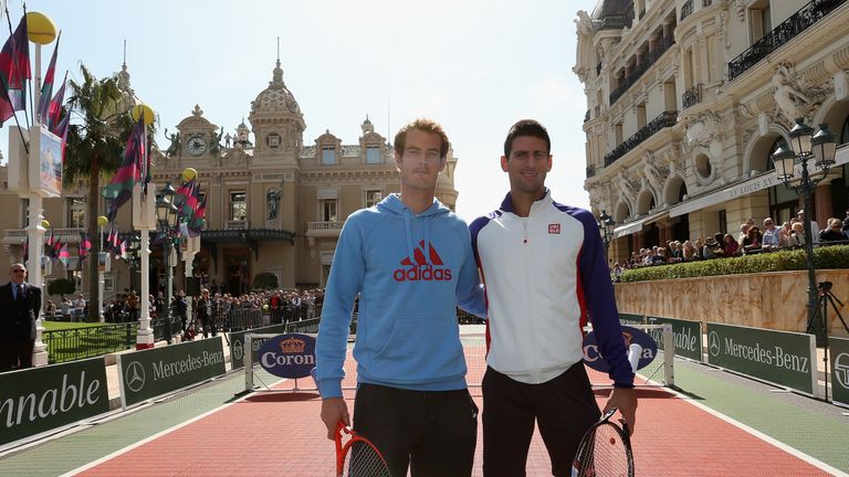 Andy Murray of Great Britain and Novak Djokovic of Serbia pose for a photograph before they play tennis in Casino Square p
