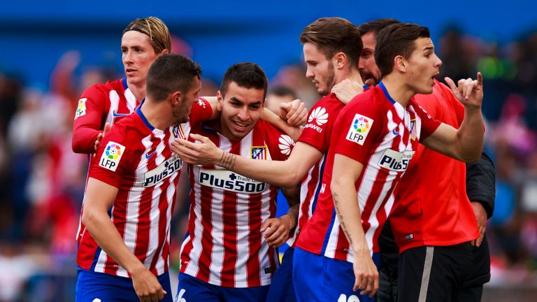 Angel Correa celebrates scoring Atletico's only goal of the game with team-mates