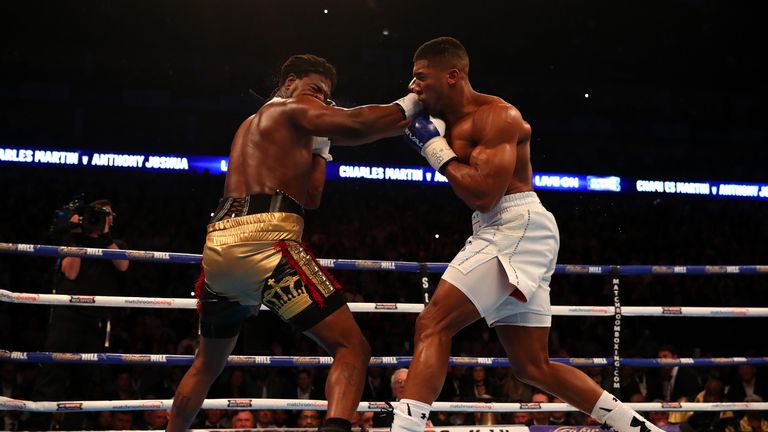 Anthony Joshua connects with a punch to Charles Martin