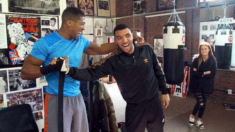 Anthony Joshua and Troy Deeney