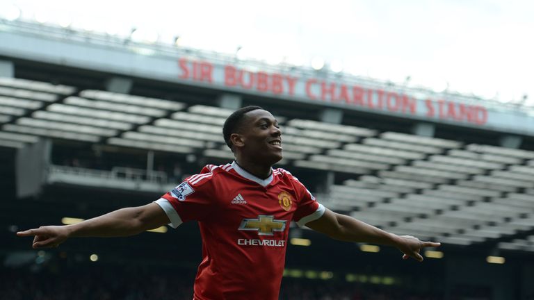 Manchester United's French striker Anthony Martial celebrates scoring the opening goal