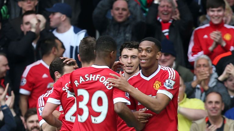 Anthony Martial of Manchester United celebrates scoring their first goal during the Barclays Premier League match 