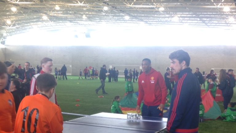 Anthony Martial joins in with the school children invited to Carrington