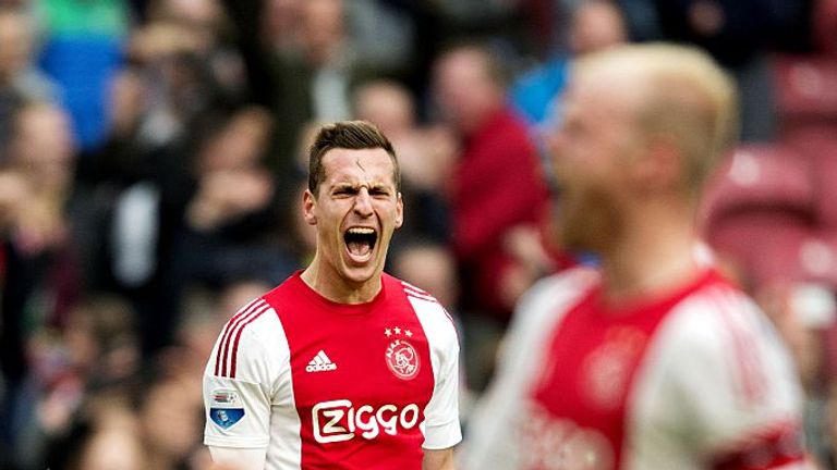 Arek Milik of Ajax Amsterdam celebrates after scoring a goal to equalise 2-2 during the Eredivisie Match against FC Utrecht in Amsterdam on April 17, 2016.