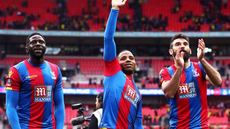 Bakary Sako (l), Jason Puncheon and Mile Jedinak (r) of Crystal Palace celebrate victory over Watford