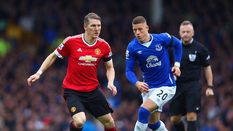 Bastian Schweinsteiger of Manchester United and Ross Barkley of Everton compete for the ball