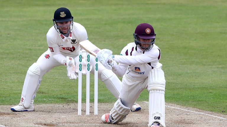 Ben Duckett of Northamptonshire reverse sweeps the ball during the Specsavers County Championship division two