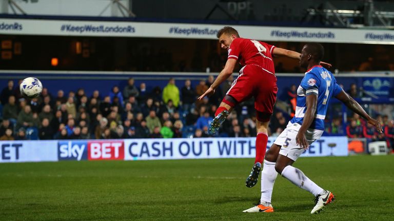Ben Gibson of Middlesbrough heads his side's third goal