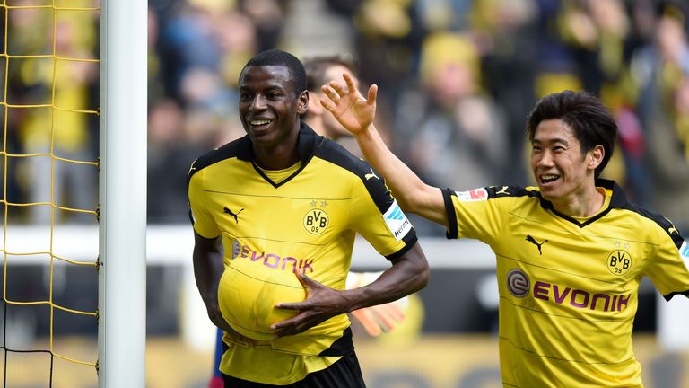 Dortmund striker Adrian Ramos (L) and his teammate  Shinji Kagawa celebrate after the 2-0 during the German Bundesliga Borussia Dortmund vs Hamburg SV 