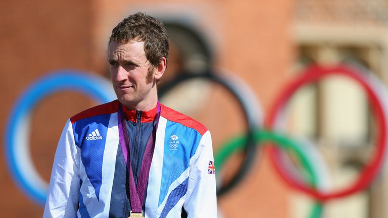 Gold medallist Bradley Wiggins of Great Britain celebrates during the victory ceremony after the Men's Individual Time Trial 