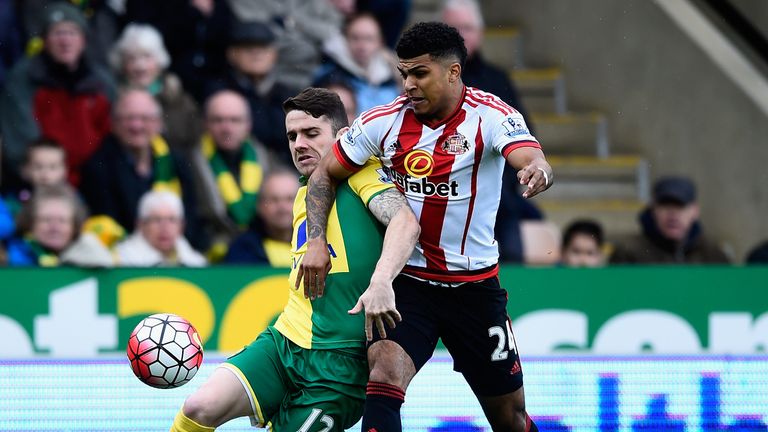 Robbie Brady of Norwich City is challenged by Sunderland's DeAndre Yedlin