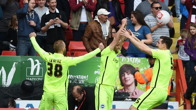 Brighton and Hove Albion's Sam Baldock (centre) celebrates scoring their first goal during the Sky Bet Championship match at The Valley, Charlton.