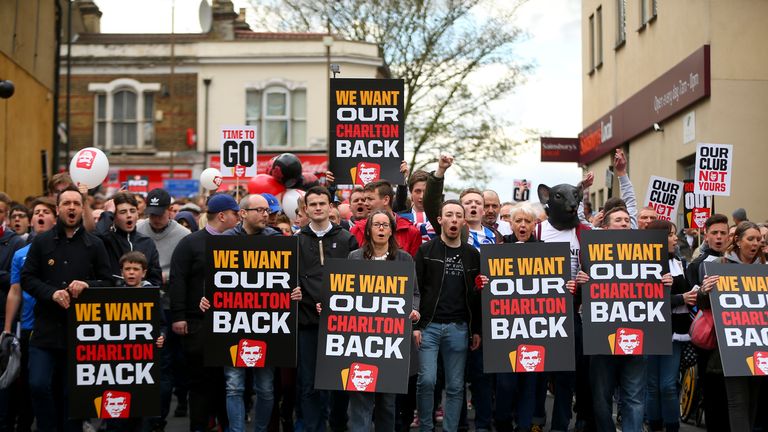  Charlton fans protest outside the ground ahead of their match against Brighton