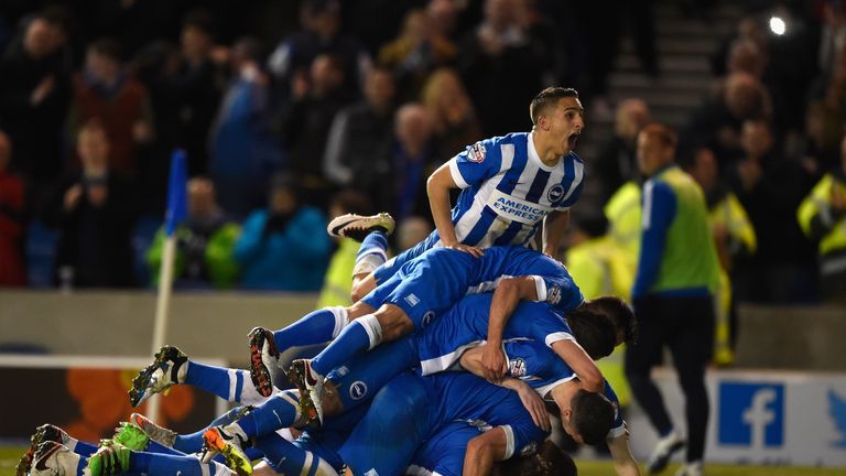 Brighton's players celebrate after scoring against QPR