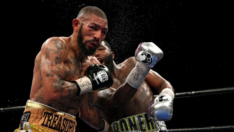 Ashley Theophane (L) and Adrien Broner 