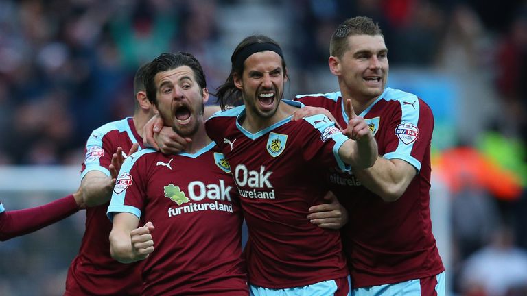 Joey Barton celebrates after his deflected free-kick put Burnley in front