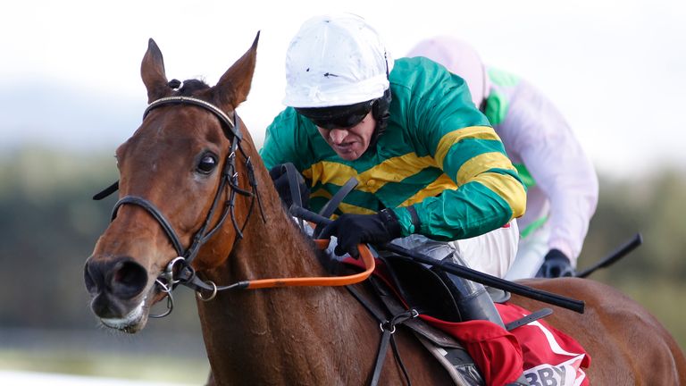 NAAS, IRELAND - APRIL 27:  Barry Geraghty riding Carlingford Lough clear the last to win The Bibby Financial 