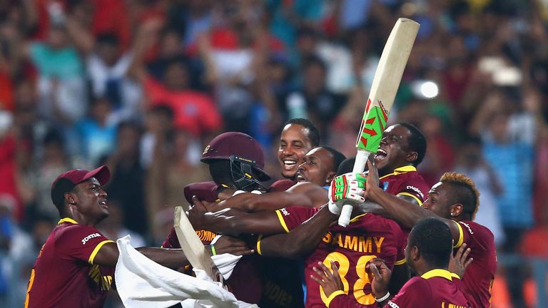 West Indies celebrate victory after Carlos Brathwaite of the West Indies hit the winning runs