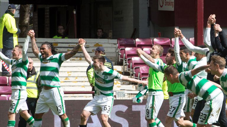 Celtic players celebrate their title success at full-time