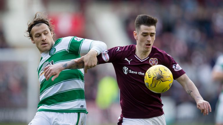 30/04/16 LADBROKES PREMIERSHIP.HEARTS v CELTIC.TYNECASTLE - EDINBURGH.Hearts ace Jamie Walker holds off Erik Sviatchenko (left)