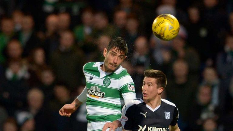 Celtic's Nir Bitton and Dundee's Cameron Kerr battle for the ball