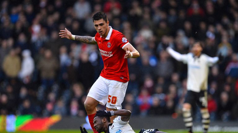 Moussa Dembele of Fulham FC and Jorge Teixeira of Charlton FC  during the Sky Bet Championship match