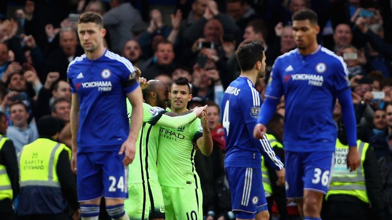  Sergio Aguero of Manchester City celebrates with team mates following scoring his sides third goal against Chelsea