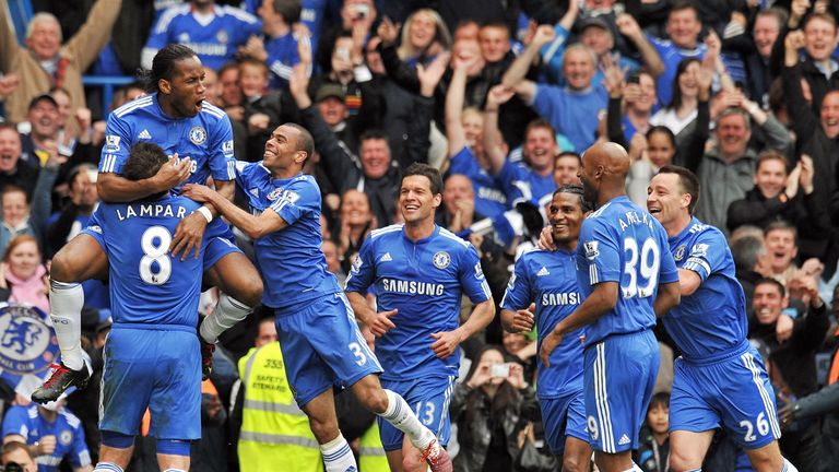Chelsea's Ivorian striker Didier Drogba (L / up) celebrates scoring the fifth goal with team-mates during the English Premier League football match between