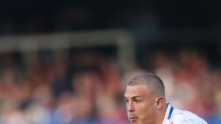 WAKEFIELD, ENGLAND - OCTOBER 03: Chris Annakin of Wakefield Wildcats disposes of the ball during the Million Pound Game between Wakefield Wildcats and Brad