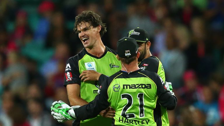 SYDNEY, AUSTRALIA - JANUARY 16:  Clint McKay of the Thunder celebrates dismissing Doug Bollinger of the Sixers during the Big Bash League match between the