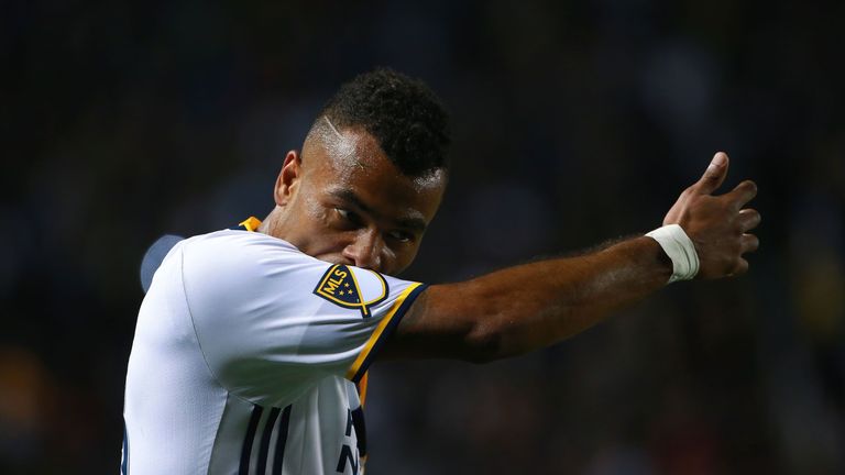 Ashley Cole #3 of Los Angeles Galaxy wipes his mouth on his sleeve during a break in game action in the first half of their MLS mat